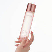 Medicube Triple Collagen Toner held in hand