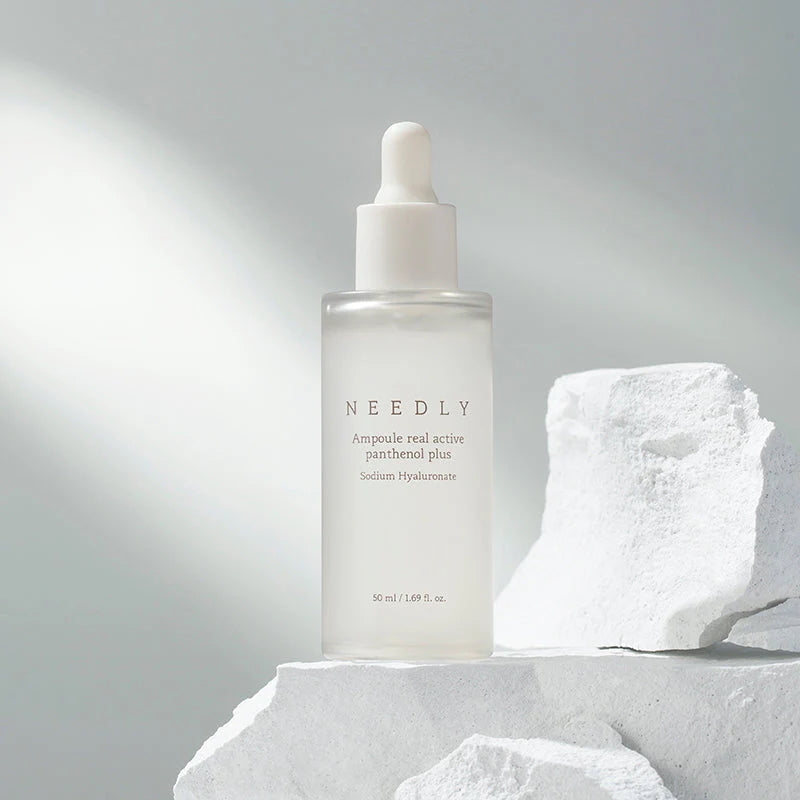 Needly Ampoule Real Active Panthenol Plus serum bottle on stone display