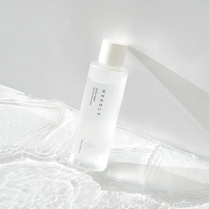 Needly Daily Toner bottle in water
