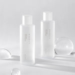 Carregar imagem no visualizador da galeria, Needly Daily Toner bottles on white background
