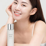 Load image into Gallery viewer, Model with TIRTIR Milk Skin Toner for hydrated and radiant skin
